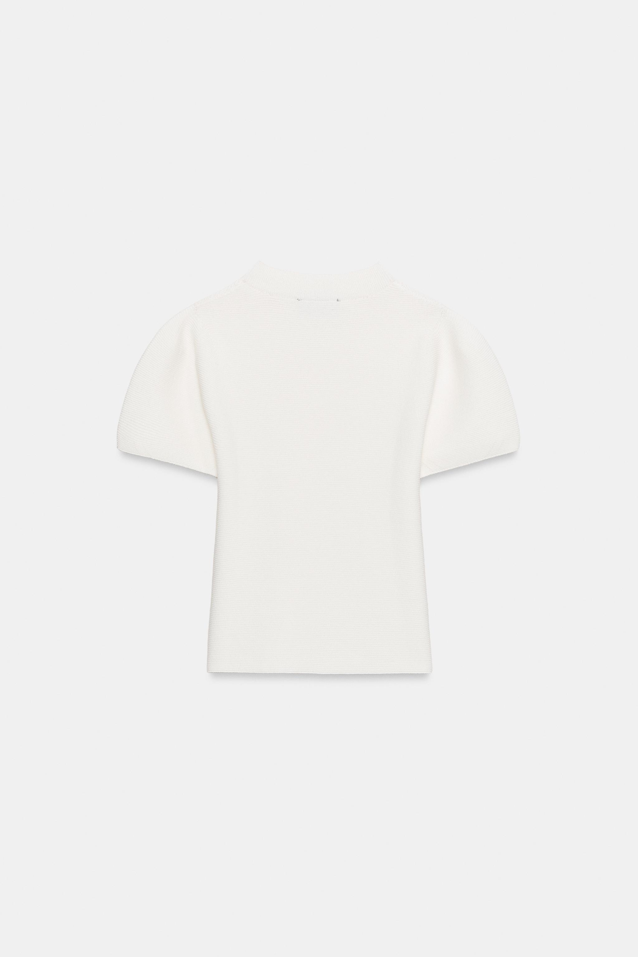 TOP EN MAILLE À MANCHES BOUFFANTES